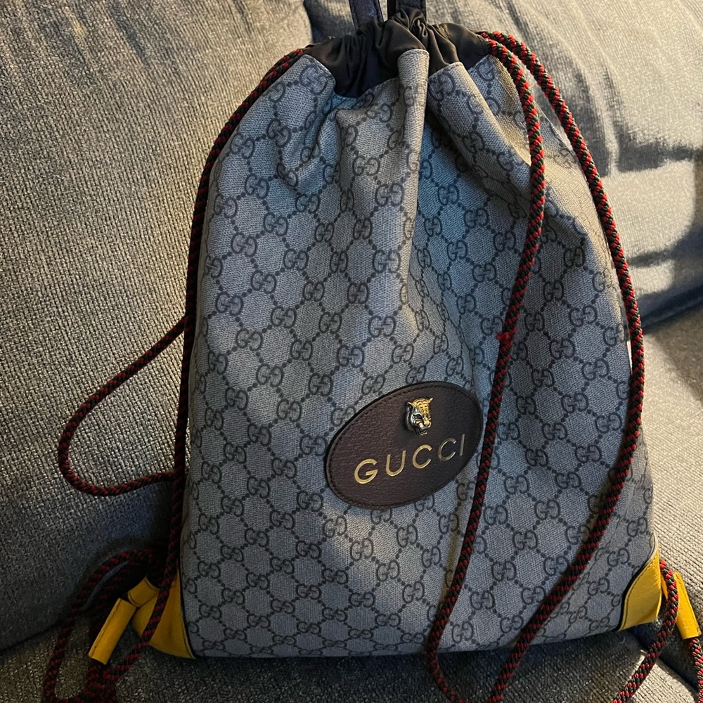 GG Supreme Monogram Neo Vintage Drawstring Backpack Yellow